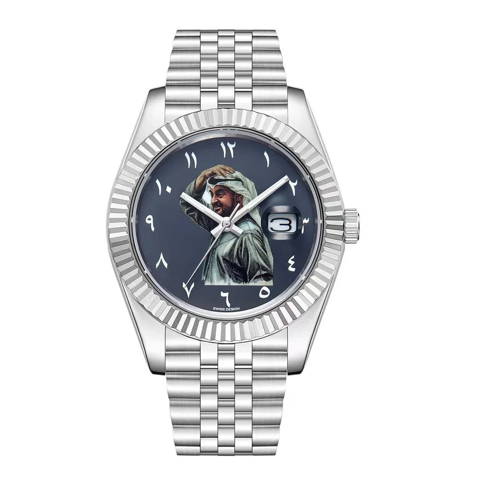 A silver-tone metal wristwatch with a fluted bezel, matching link bracelet, and a dark blue dial featuring a painted portrait of a robed figure with Arabic numerals instead of standard hour markers. Salam Luxury UAE