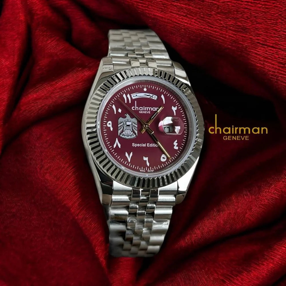 Maroon - Silver watch with a red face on a red fabric background, featuring the brand 'Chairman'.
Salam Luxury