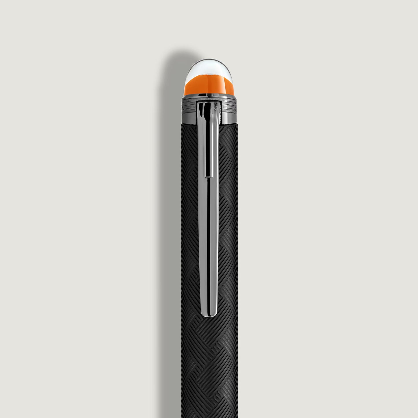 Detailed close-up of the silver clip and the translucent cap dome with the floating signature emblem on the StarWalker Extreme pen - Salam Luxury.