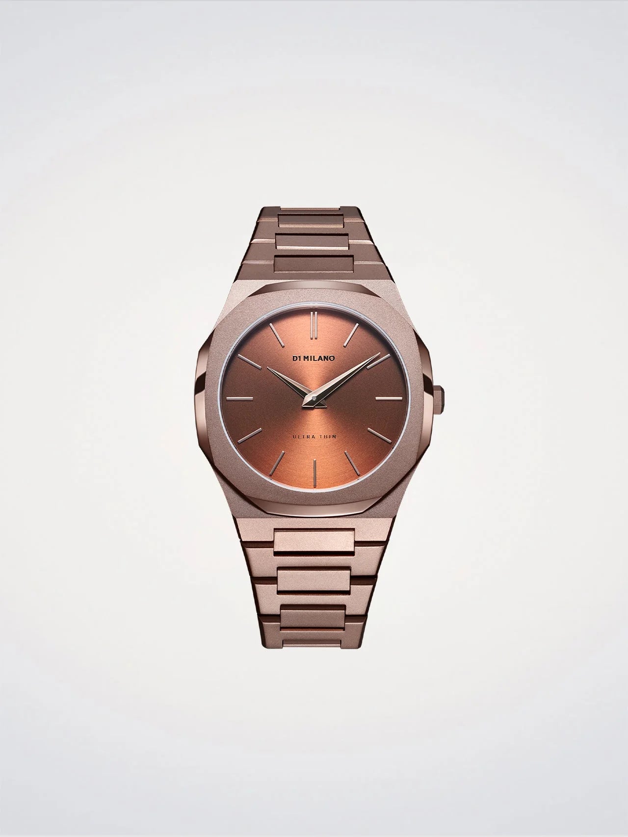 Rose gold watch with a metallic band on a light gray background
Salam Luxury