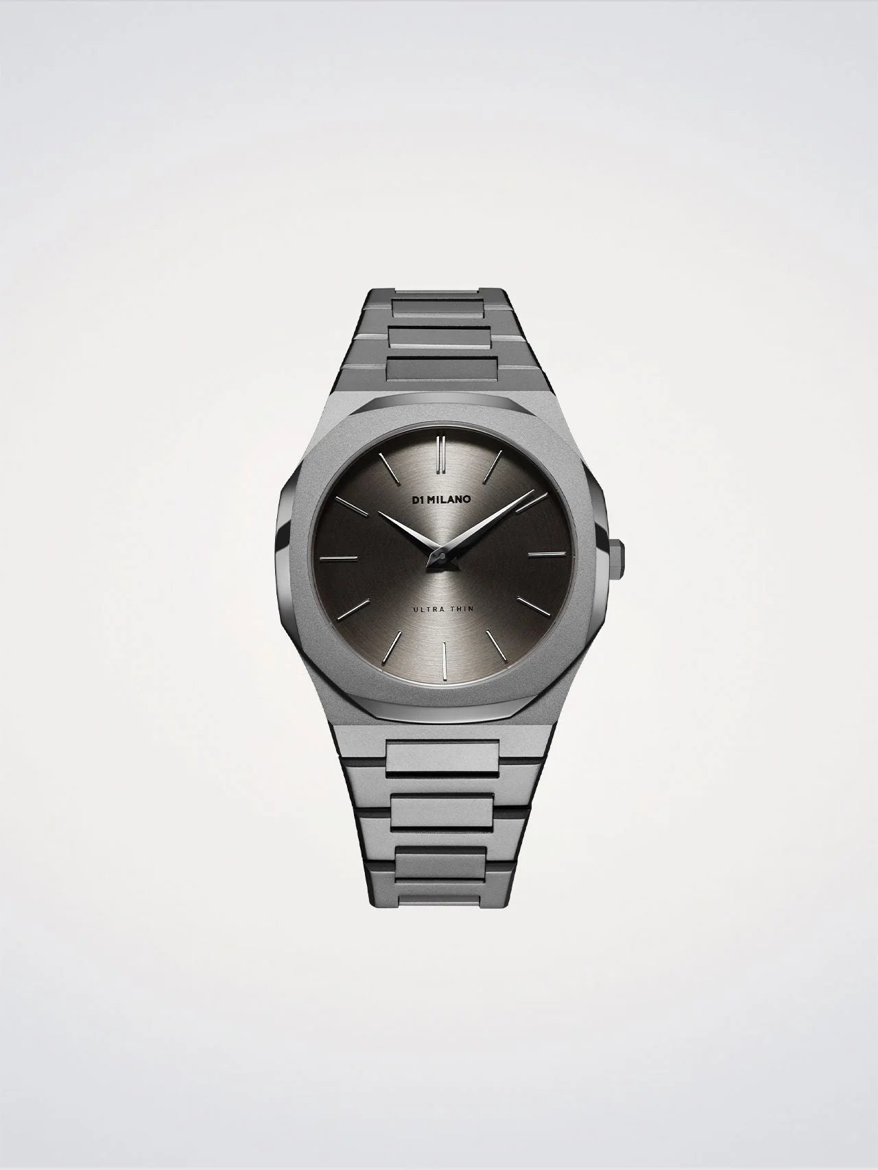 Silver watch with a metallic band on a light gray background
Salam Luxury
