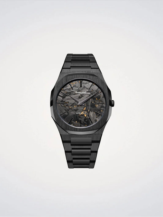 Black watch with a detailed face on a light gray background
Salam Luxury