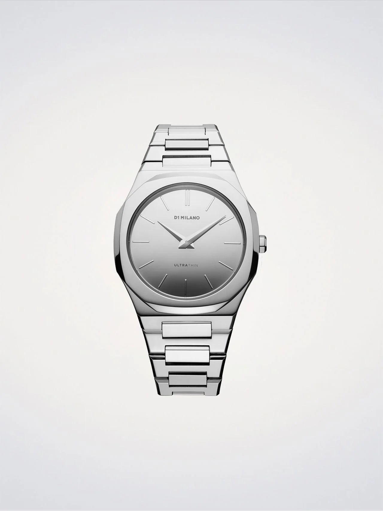 Silver watch with a metallic band on a light gray background
Salam Luxury