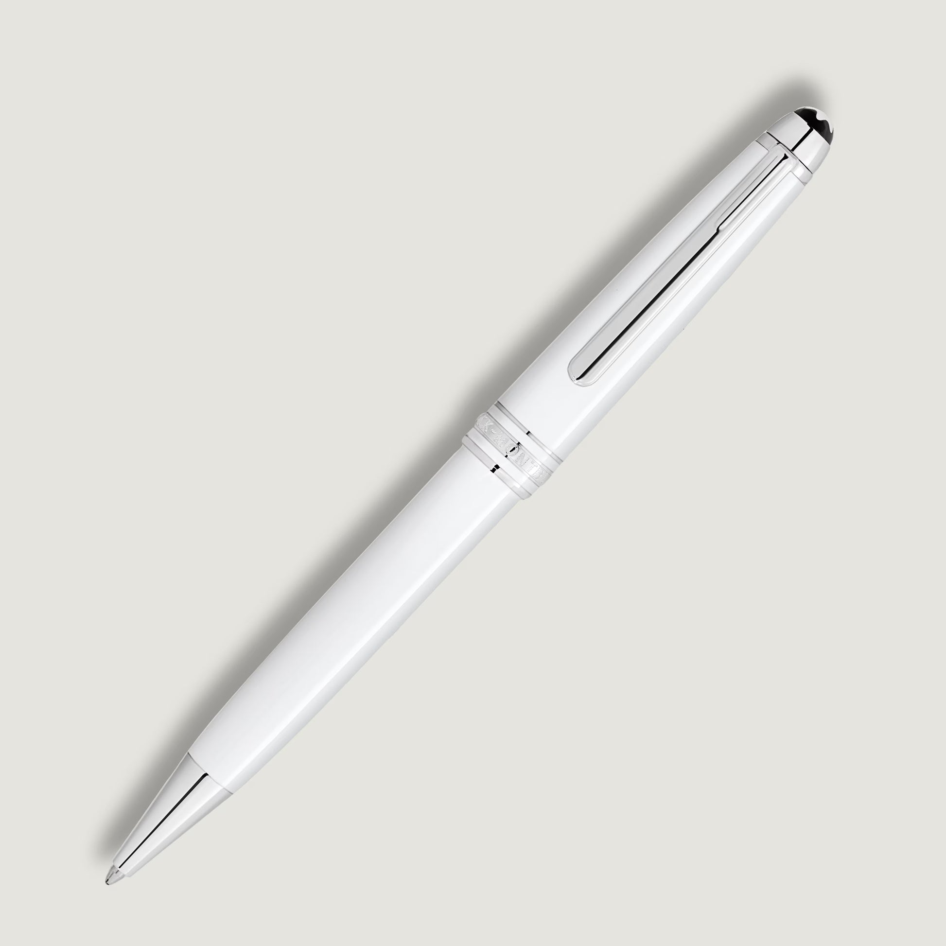 Premium Montblanc Meisterstück style white solitaire ballpoint pen displayed diagonally, online at Salam Luxury.
