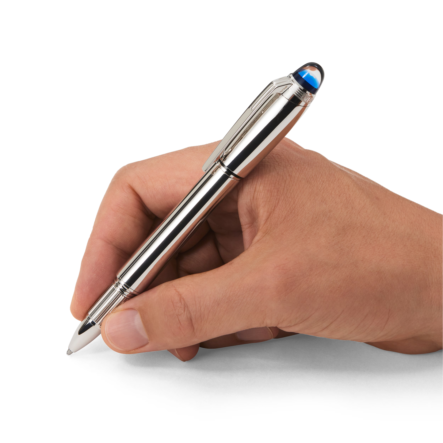 Person writing with Montblanc StarWalker silver metal pen on black background - Salam Luxury