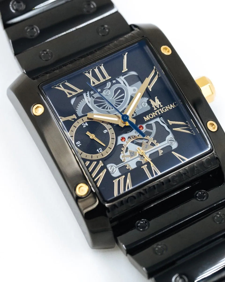 Black | Close-up of Salam Luxury black rectangular skeleton dial featuring gold hardware and Roman numeral markers.