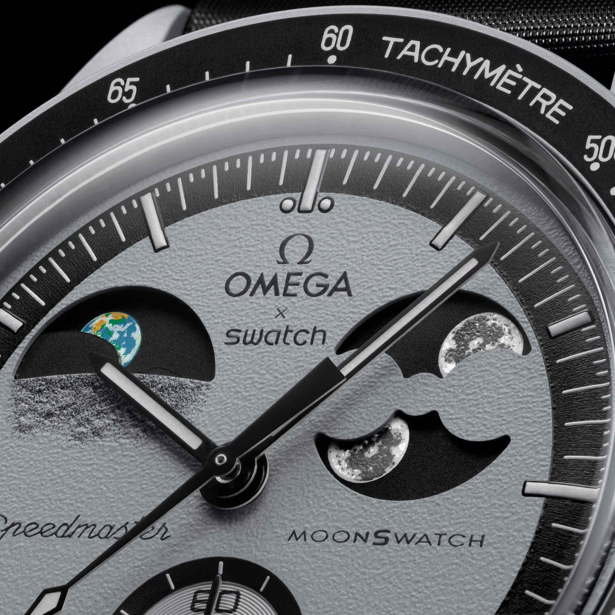 Earthphase | Close-up of grey dial with Earthphase and Moonphase indicators - SALAM LUXURY