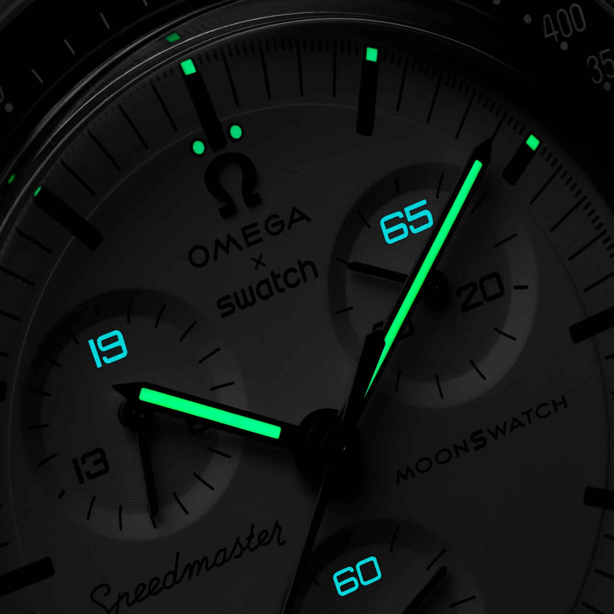 OMEGA x Swatch MoonSwatch white dial showing green Super-LumiNova glow in the dark – SALAM LUXURY