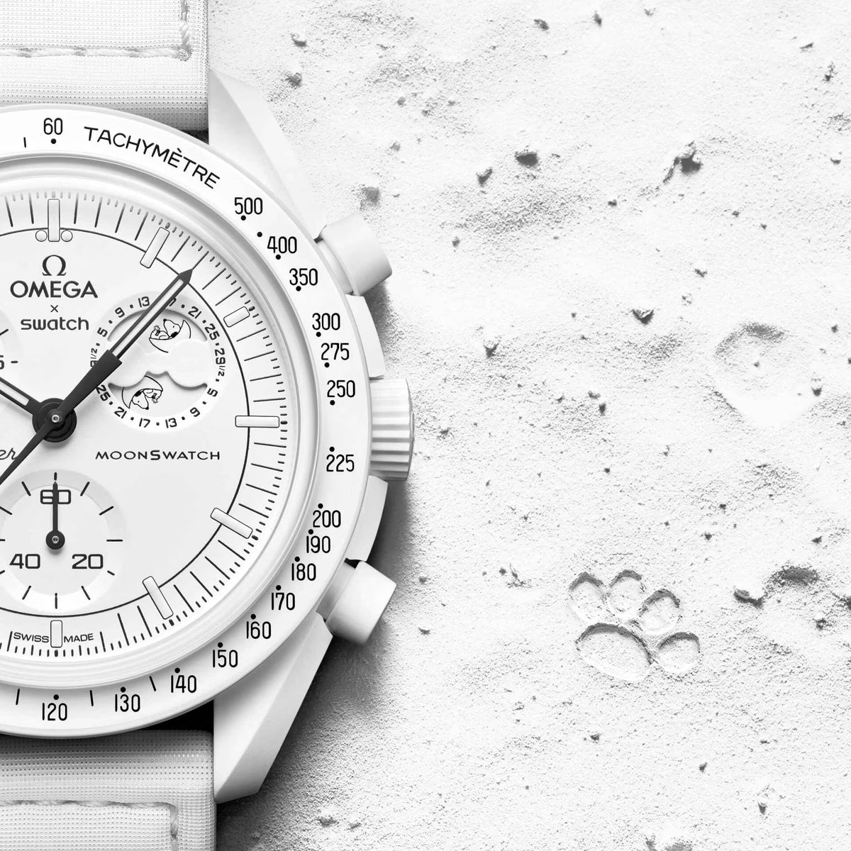 White | Omega x Swatch Snoopy White watch on white surface with paw prints - SALAM LUXURY