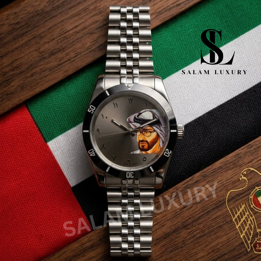 Silver watch with a face on the dial on a flag background, featuring the Salam Luxury brand.
MBZ Watch Salam Luxury