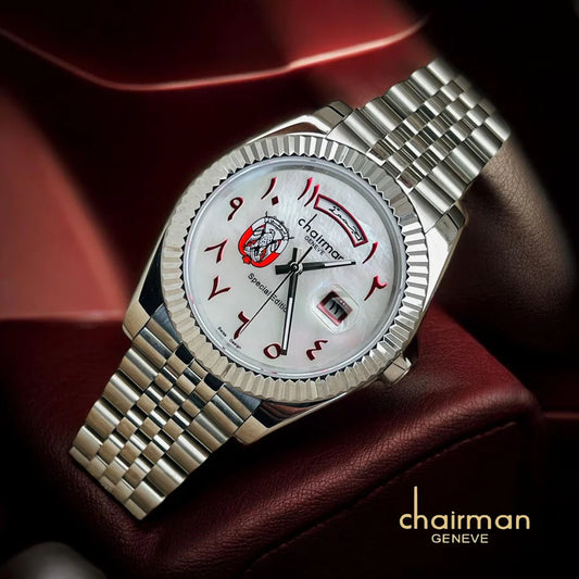 Silver wristwatch with a white face on a dark background, featuring the 'Chairman' brand.
Salam Luxury