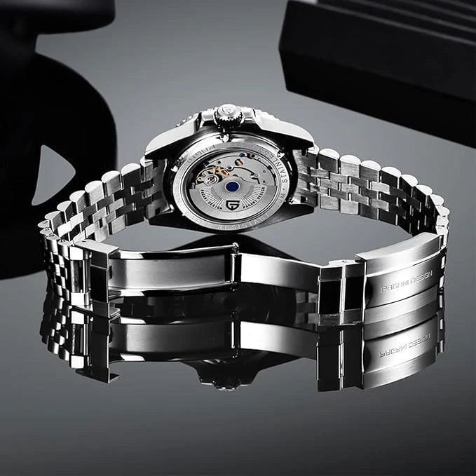 Silver wristwatch with a reflective surface on a dark background
Salam Luxury