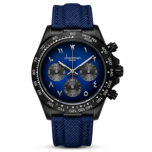 Blue | A wristwatch with a textured blue fabric strap, a black case, and a blue dial featuring white Arabic numerals and subdials. The brand name 'chairman' is visible on the dial.