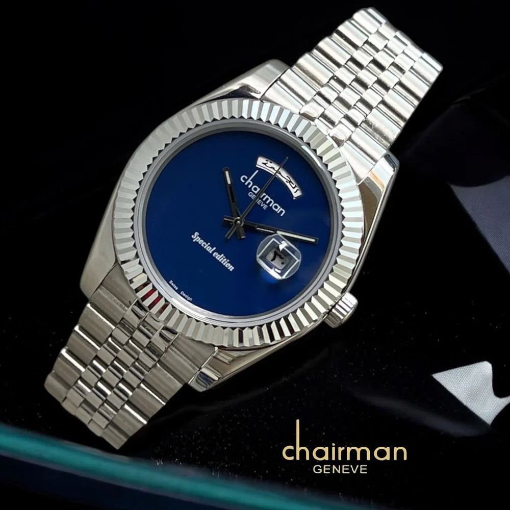 Silver watch with blue face on a dark background, featuring the brand 'Chairman'.
Salam Luxury UAE