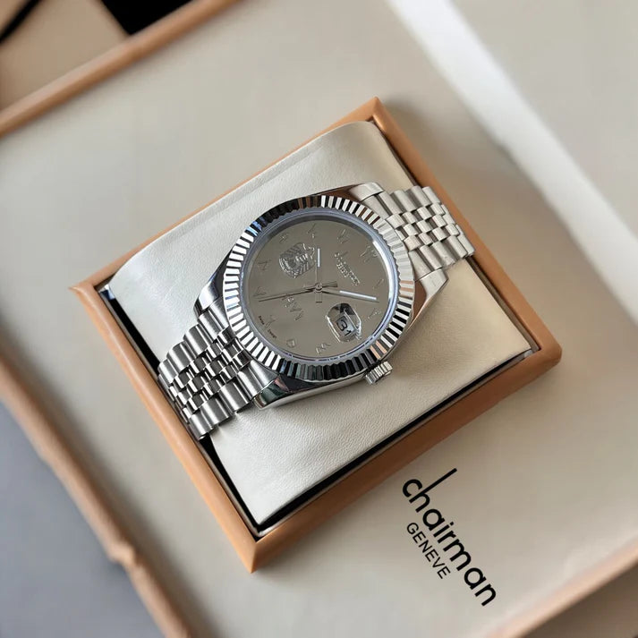Silver watch in a Chairman Geneve box on a light background
Salam Luxury