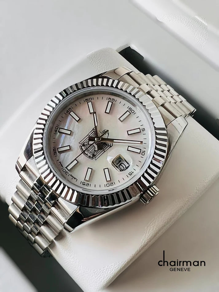 Silver watch with a white face on a white surface, featuring the brand 'Chairman Geneve'.
Salam Luxury