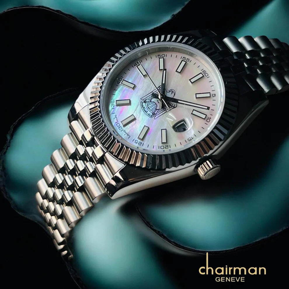 Silver watch with a colorful face on a dark background, featuring the brand 'Chairman Geneve'.
Salam Luxury
