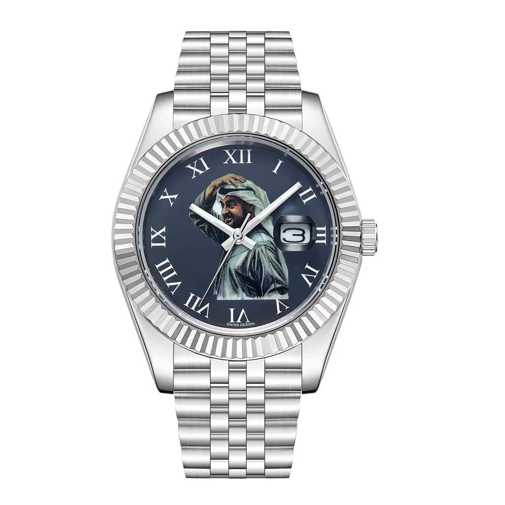 A silver stainless steel watch with a fluted bezel and a dark blue dial featuring a detailed illustration of the Statue of Liberty. The watch has Roman numeral hour markers, silver hands, and a date window at the 3 o'clock position.
Salam Luxury UAE