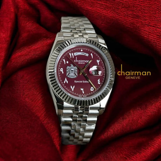 Maroon - Silver watch with a red face on a red fabric background, featuring the brand 'Chairman'.
Salam Luxury