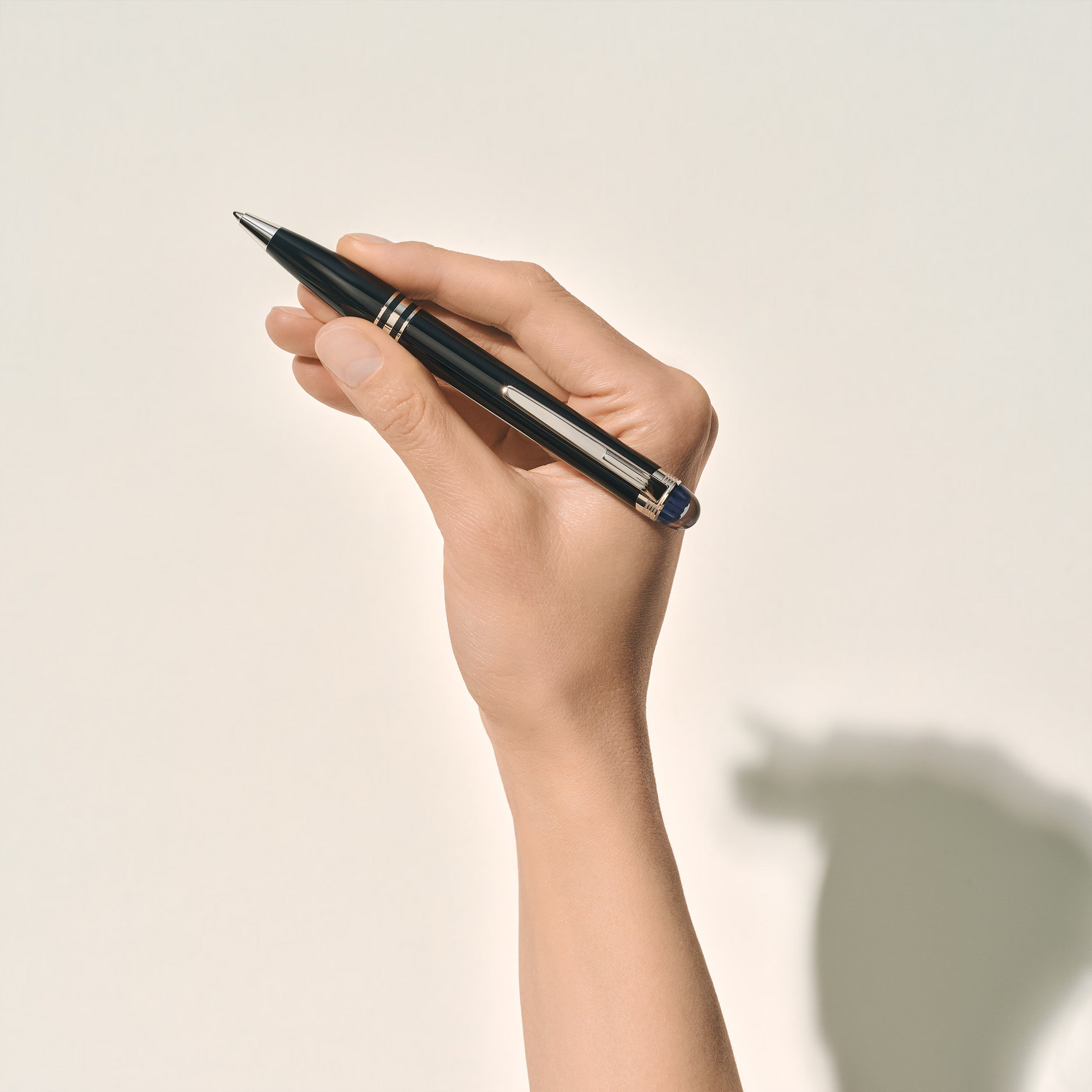 Black | Hand model posing with the elegant black Montblanc StarWalker ballpoint pen available at Salam Luxury.