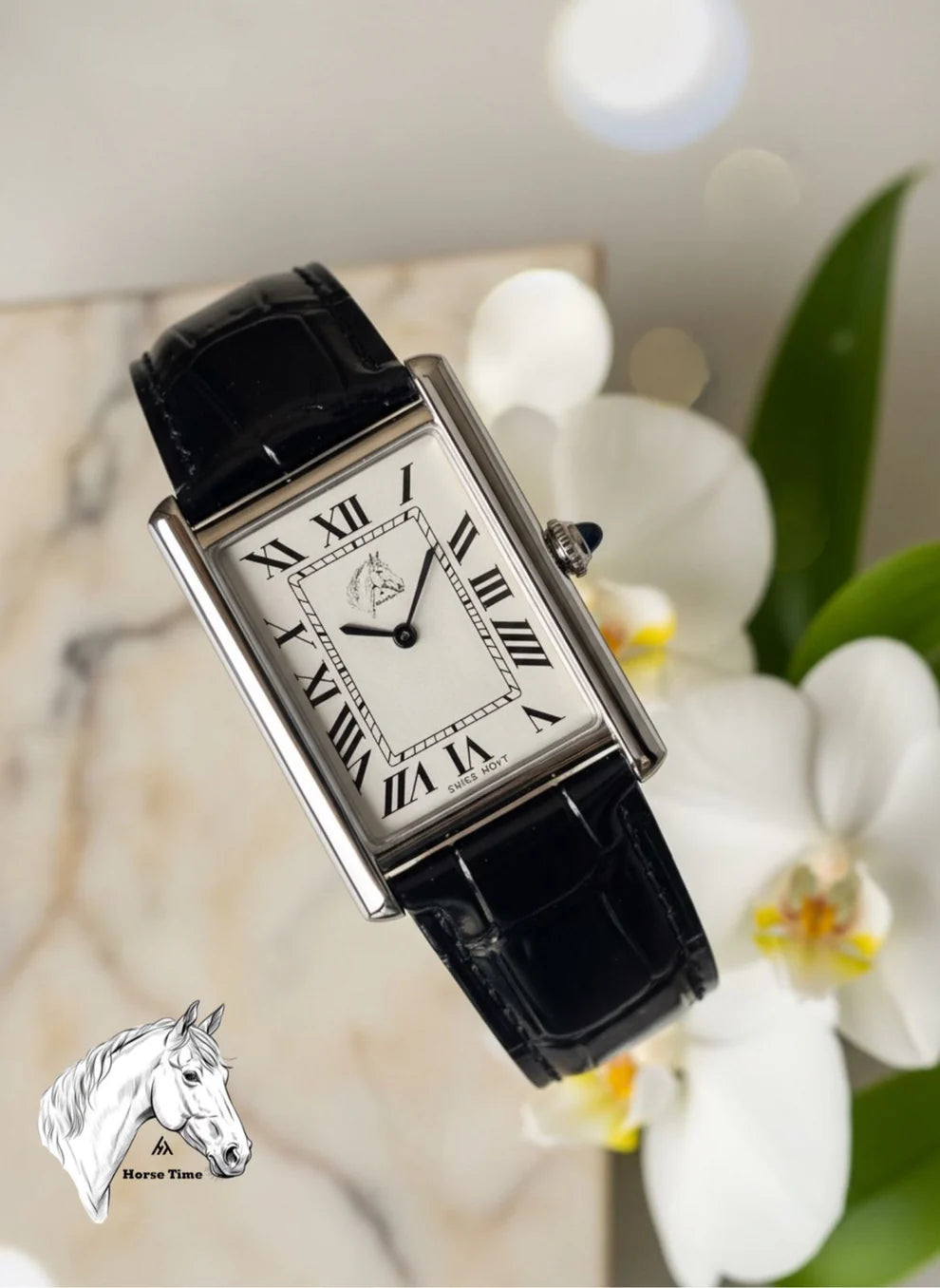 Black |Rectangular watch with black leather strap on a blurred floral background
Salam Luxury 