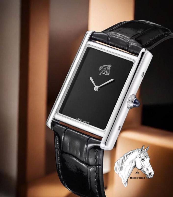 Luxury watch with black leather strap and black face on a blurred background 
Salam Luxury