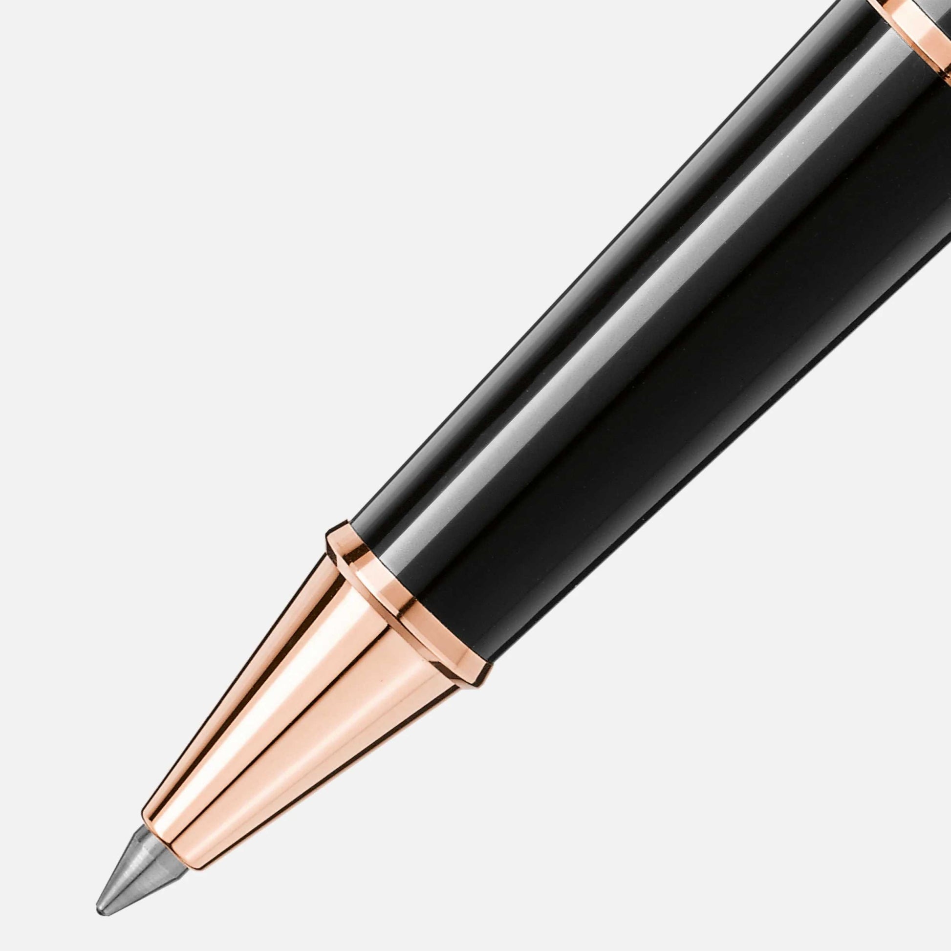 Pen with black and rose gold design on a light gray background
Salam luxury
