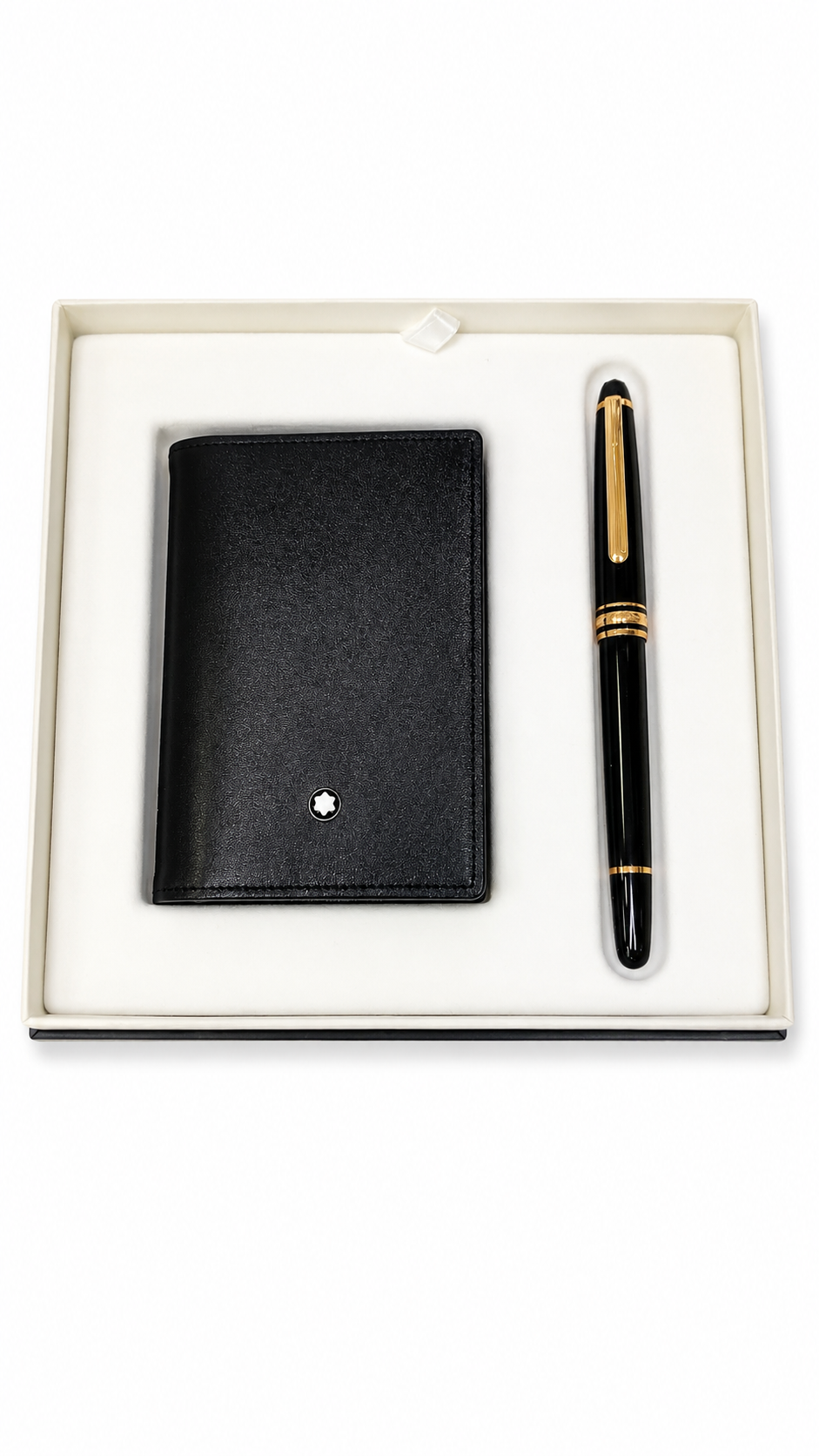 Black leather cardholder and fountain pen set in a box on a white background
Shop this From Salam luxury