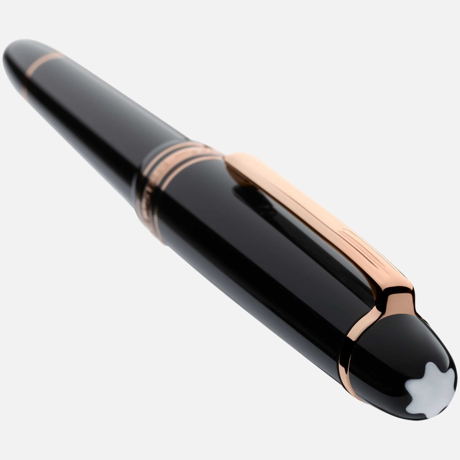 Black pen with rose gold accents on a white background
Salam luxury
