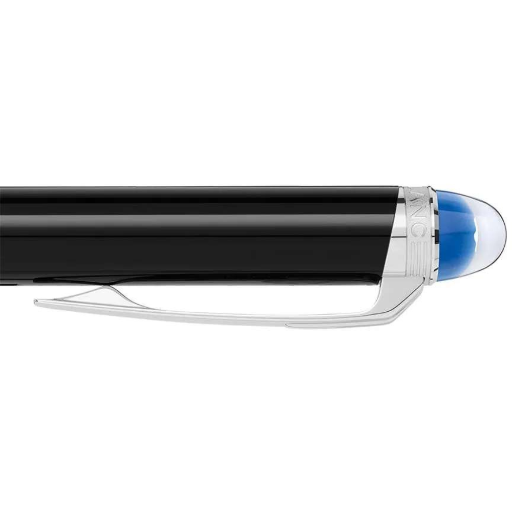 Black | Close-up of the translucent blue dome and floating star emblem on the black Montblanc StarWalker pen from Salam Luxury