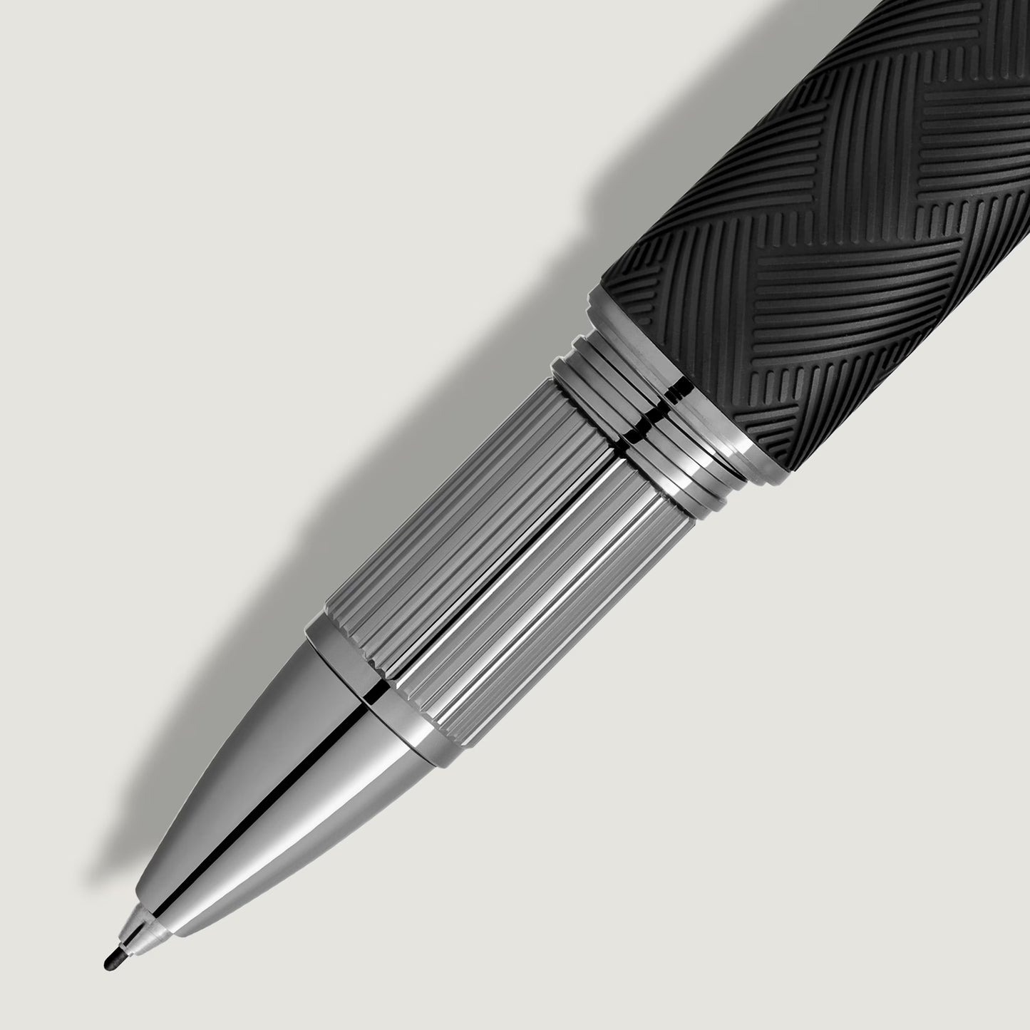 Macro view of the textured silver metal grip and precision tip of StarWalker Extreme pen from Salam Luxury.