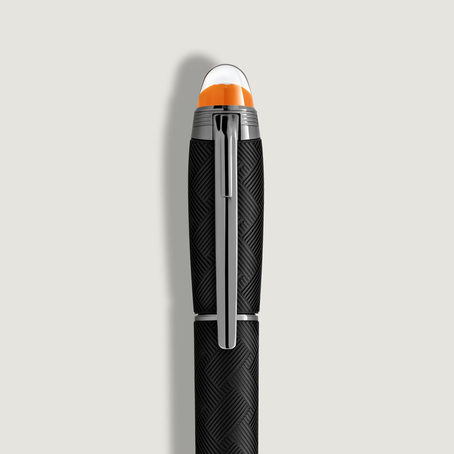 Close-up of the premium silver clip and translucent dome with floating star emblem on Salam Luxury.