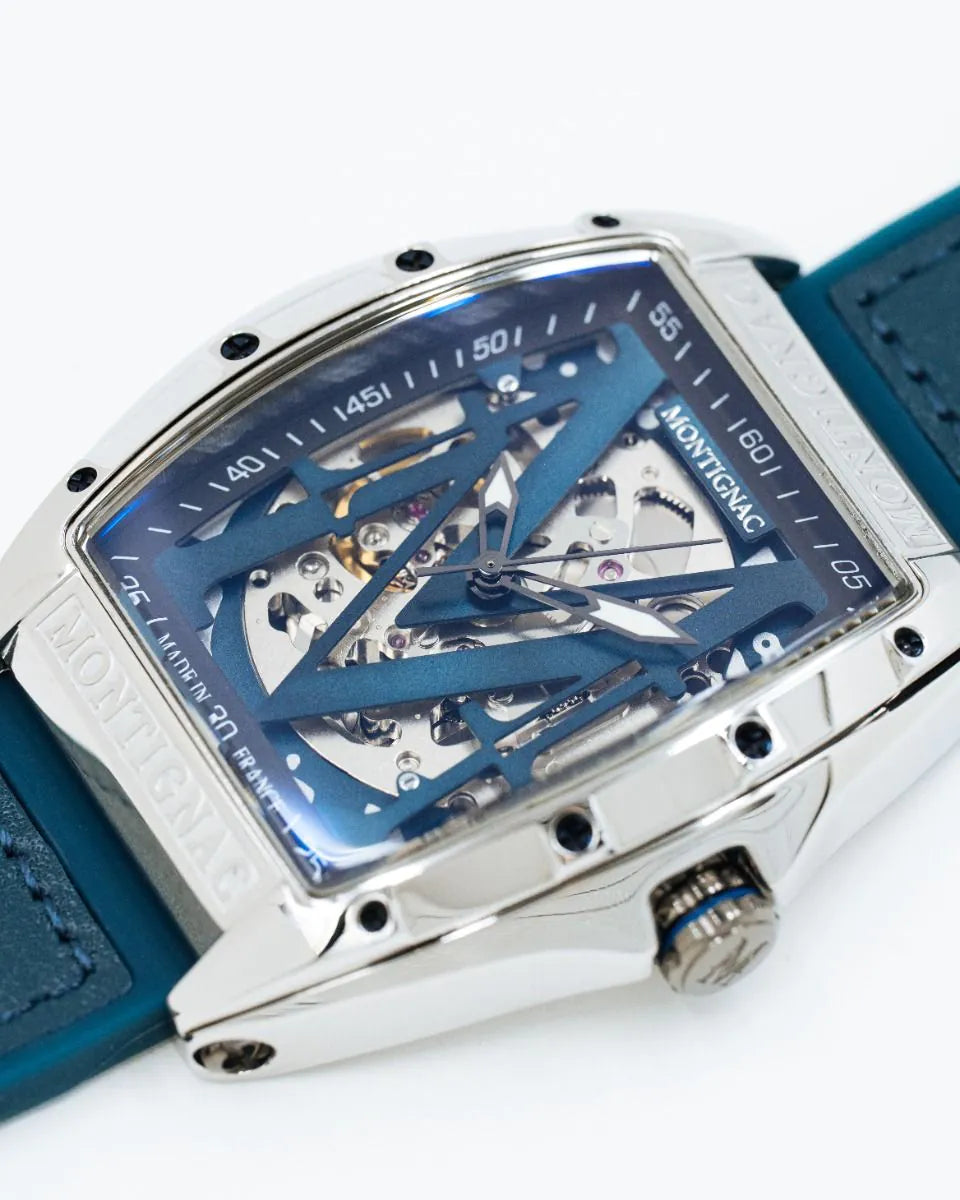 Luxury watch with blue strap and transparent face on a white background
Salam Luxury