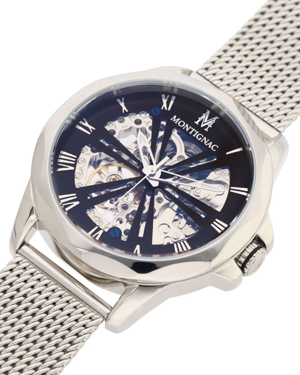 Montignac watch with blue dial and silver mesh band on a white background