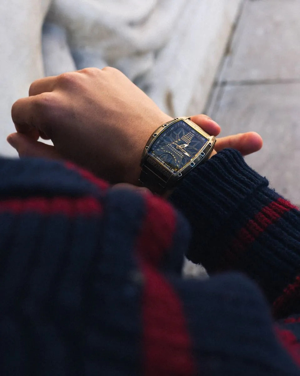 Hand wearing a watch with a blurred background
Salam Luxury