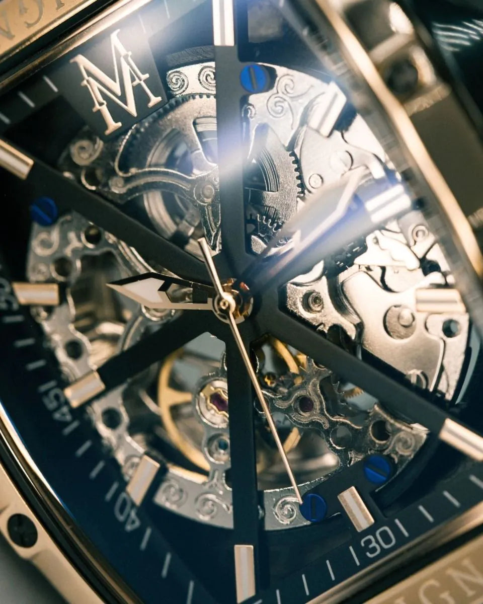 Close-up of a mechanical watch with visible gears and brand logo.
