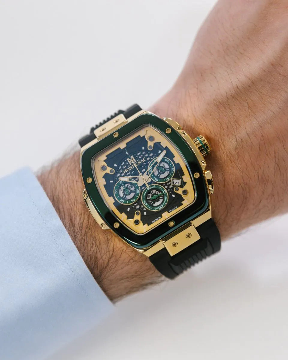 Green | Luxury watch with gold and green accents on a wrist against a white background Salam Luxury 