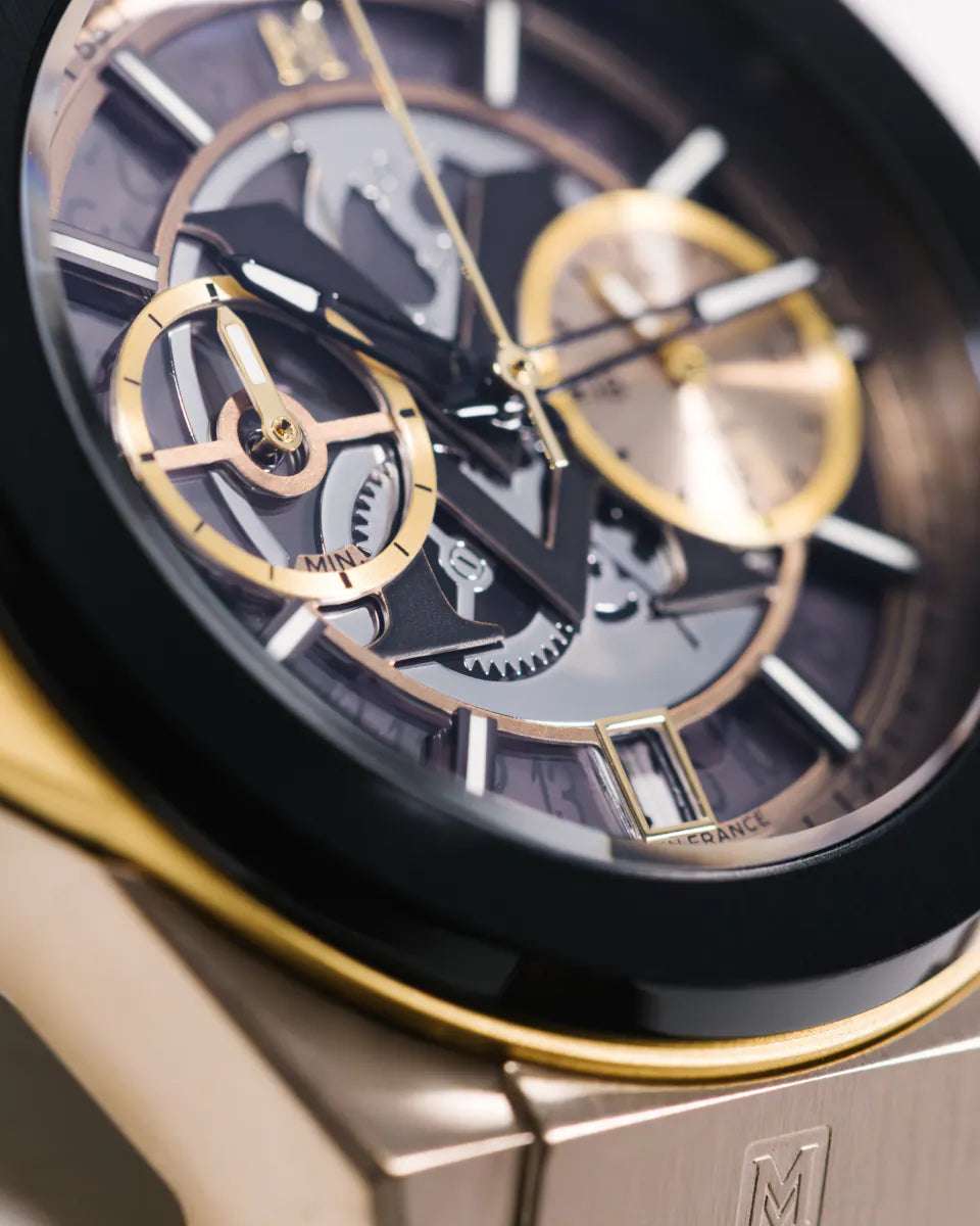 Champagne | Close-up of a luxury watch with intricate design and gold accents.
Salam Luxury