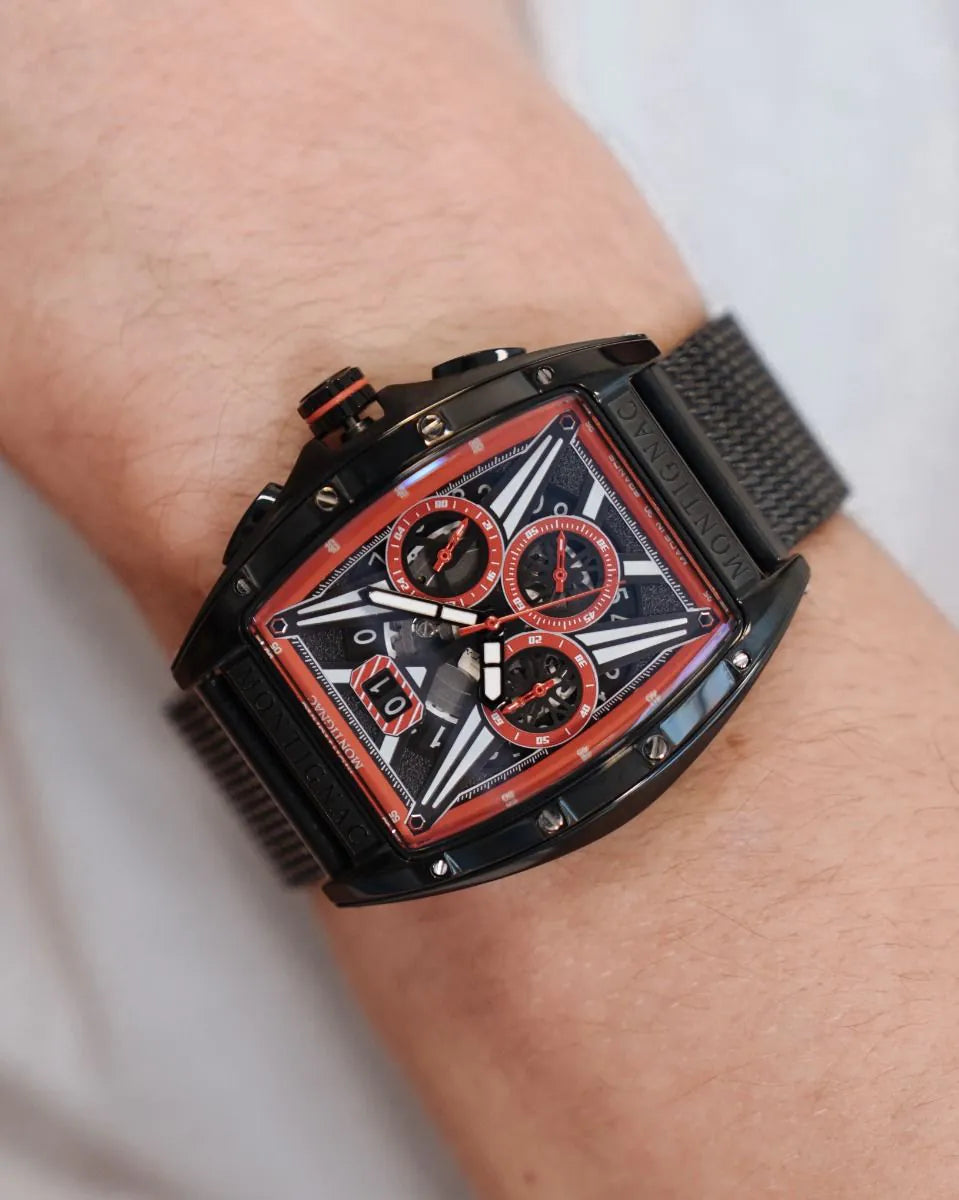 Luxury watch with black and red design on a wrist against a neutral background
Salam Luxury