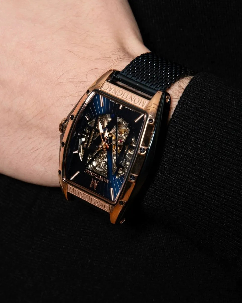 Luxury watch with intricate design on a person's wrist against a dark background
Salam Luxury
