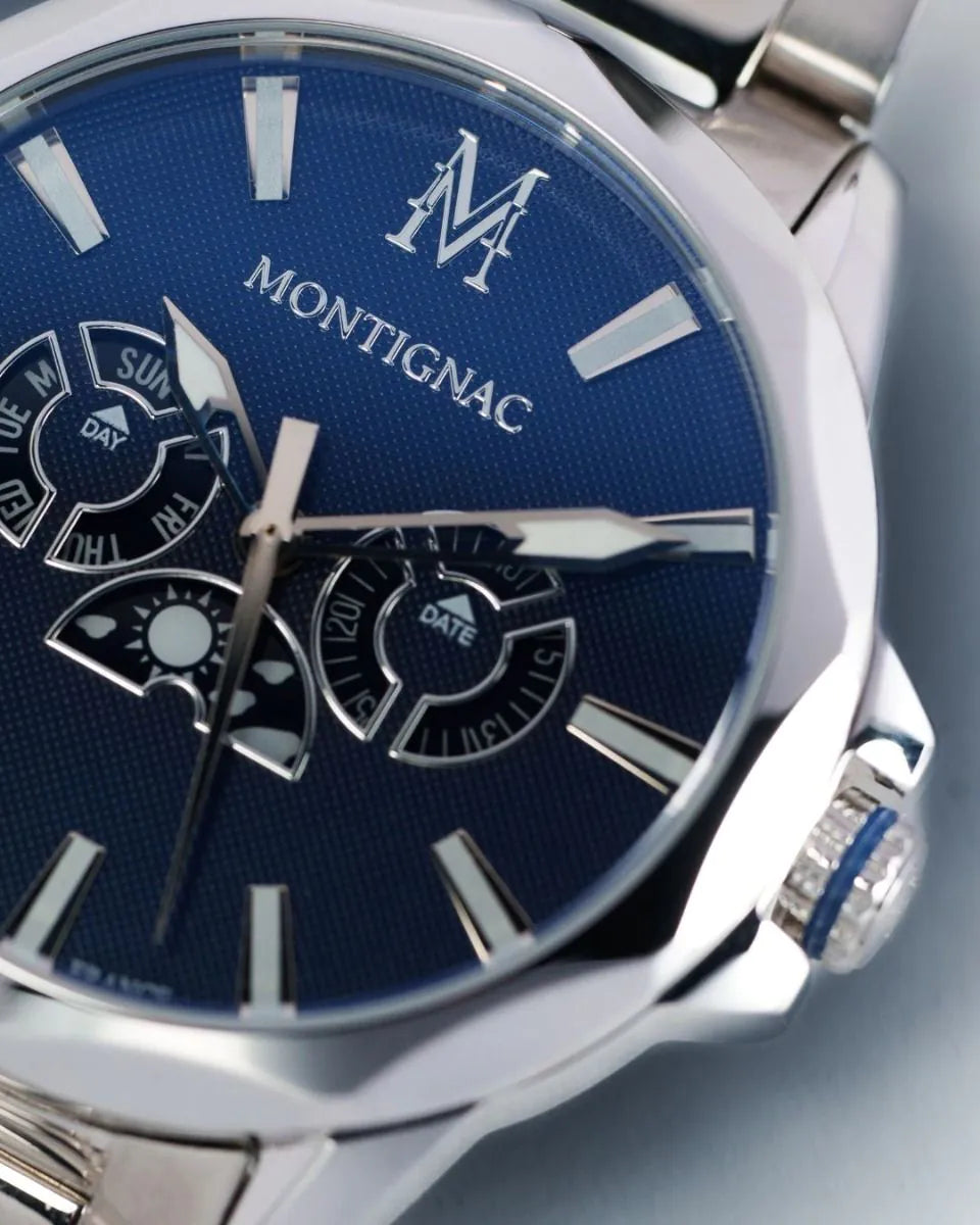 Montignac watch with blue dial and silver case on a light gray 
background
Salam Luxury