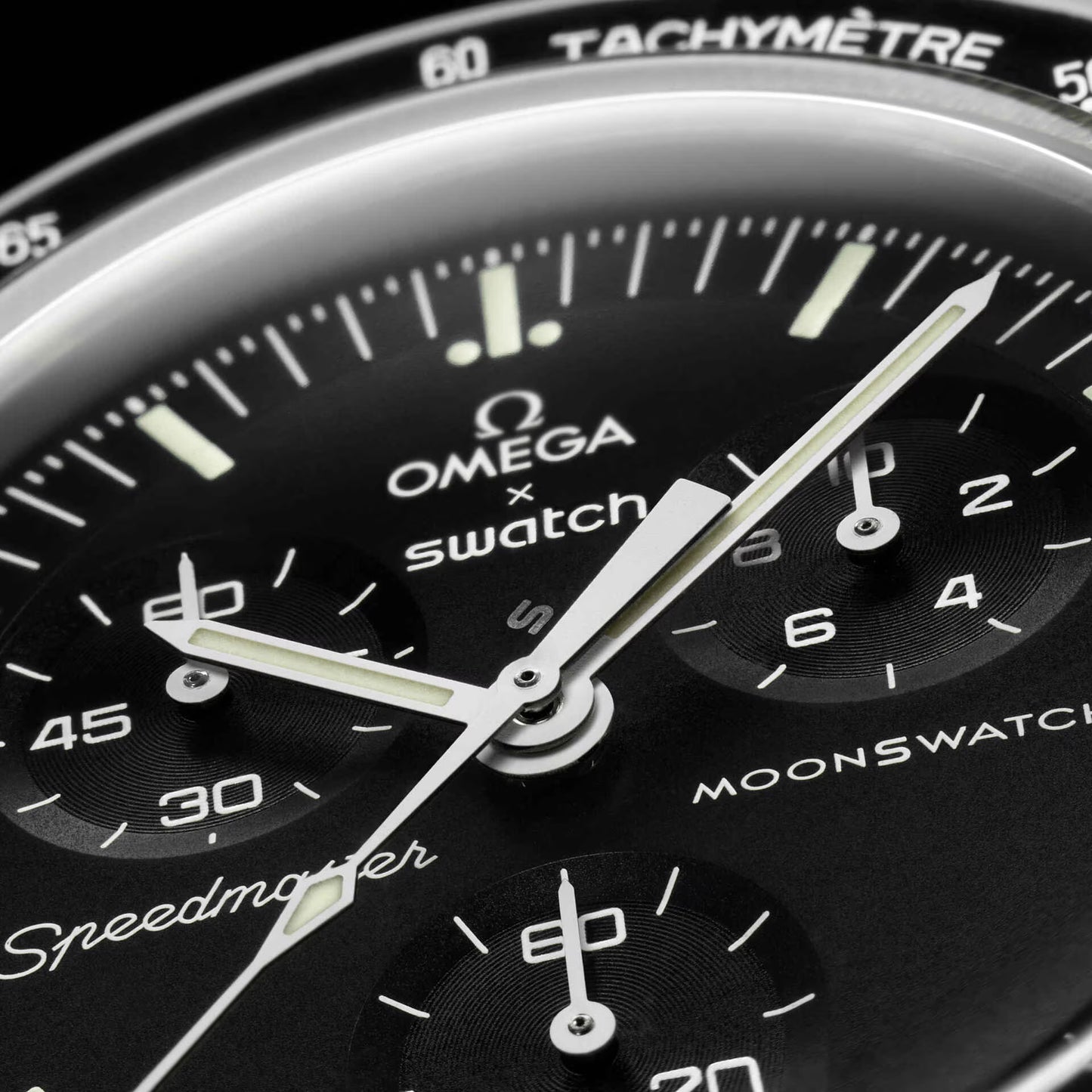 Close-up of a Omega x Swatch Moonswatch Speedmaster watch face