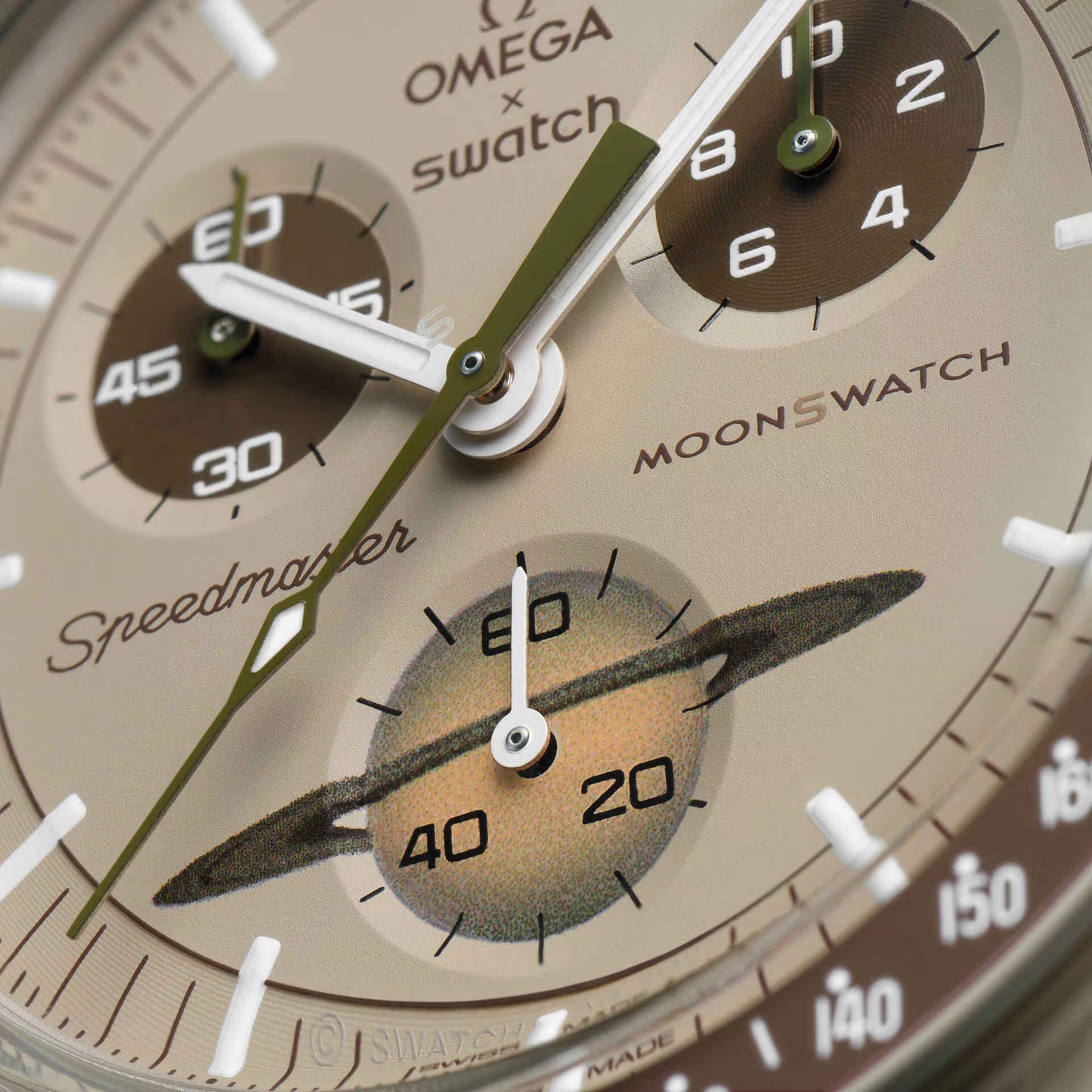 Close up of Omega x Swatch MoonSwatch Saturn dial showing hands and subdial with Saturn rings