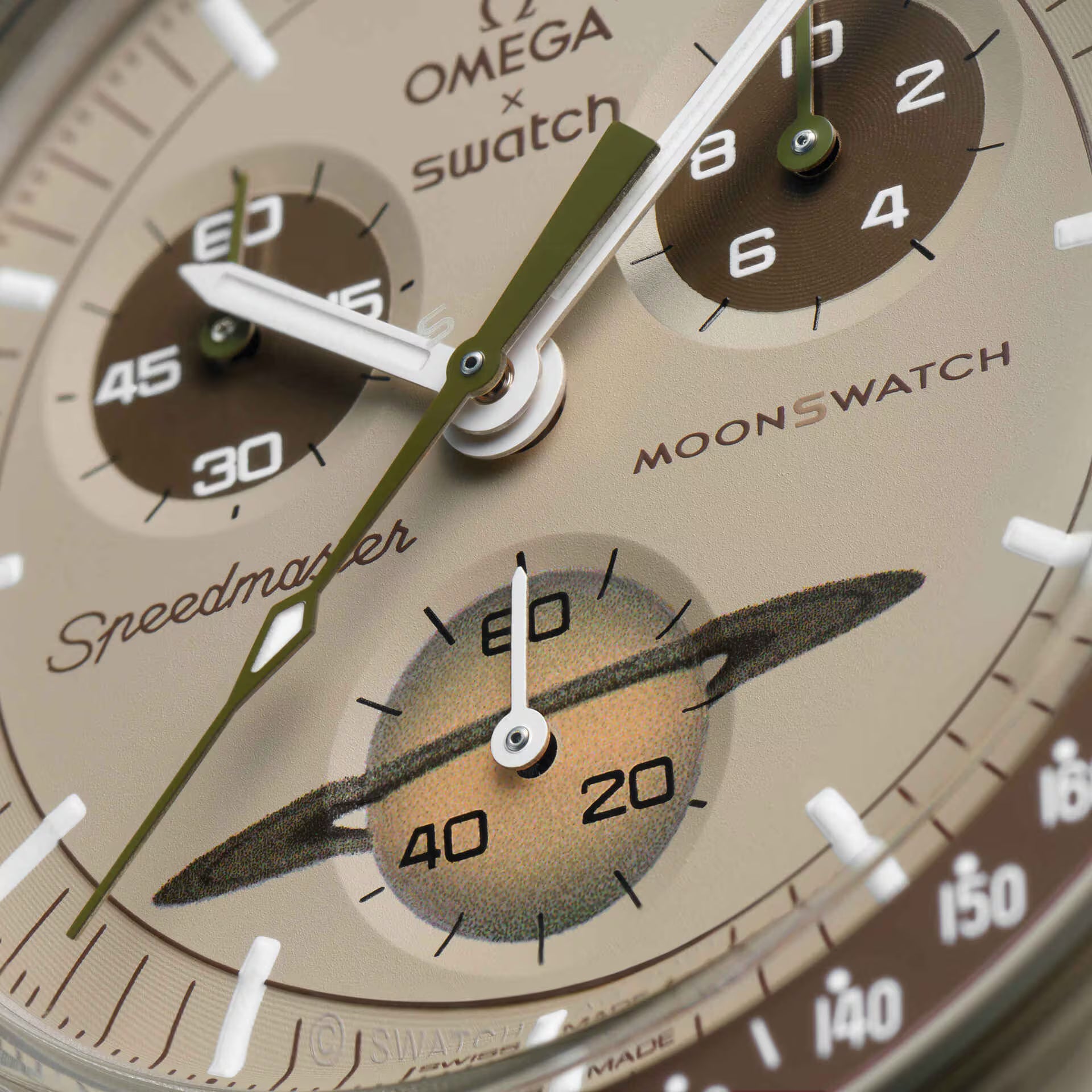 Close up of Omega x Swatch MoonSwatch Saturn dial showing hands and subdial with Saturn rings