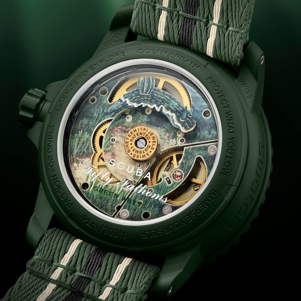 Salam Luxury close-up of the automatic movement and decorated caseback on the Blancpain x Swatch SO35G100