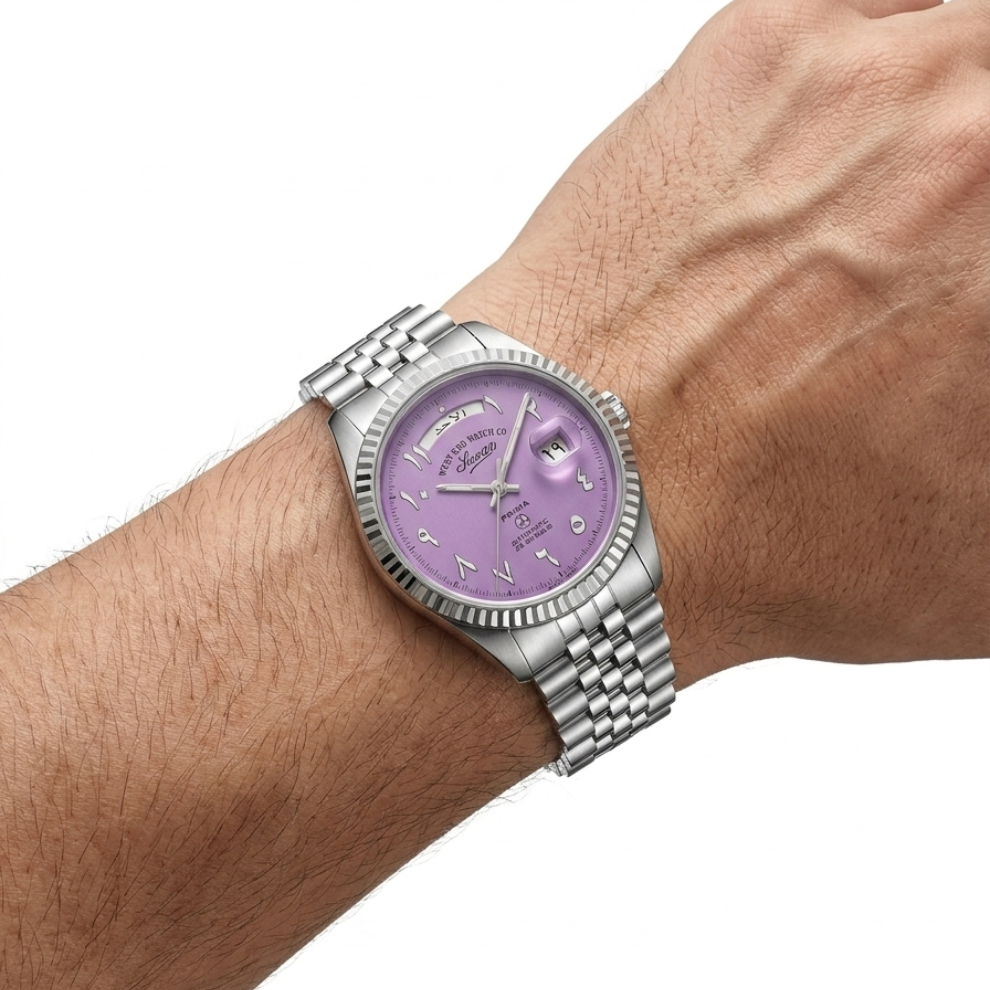 Watch with a purple face on a wrist against a white background
available at Salam Luxury.
